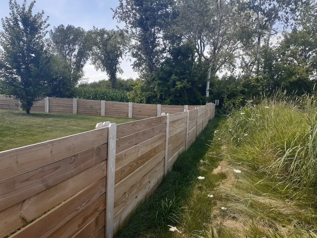 Side of a 6' tall wood privacy fence with horizontal wood paneling